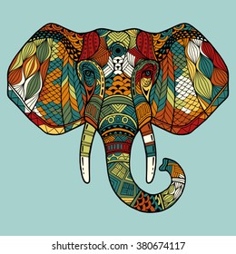 Elephant head. An abstract image of an elephant head with a black stroke and partial multi-color fill. It may be used for design of a t-shirt, bag, postcard, a poster, banner. Vector. Logo. Icon.