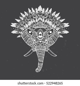 Elephant head with american indian chief headdress feather. Print for clothes, cards, picture banner for websites. Ethnic Indian ornaments. Vector illustration