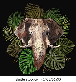 Elephant head and palm leaves. Embroidery indian jungle style. Wildlife art. Template for clothes, textiles, t-shirt design 