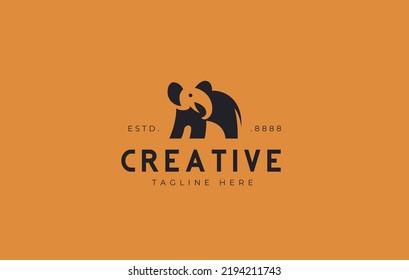 Elephant Negative Space Logo Design. Vintage Retro Logo Elephant Silhouette, Wild Elephant Vector Illustration.
