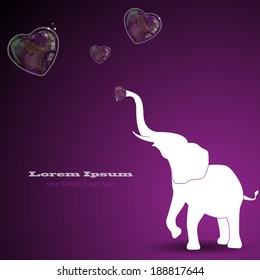 Elephant playing with a heart soap