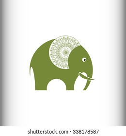 Elephant. Vector drawing. A stylized drawing of an elephant with a lace pattern on the ears. Side view.