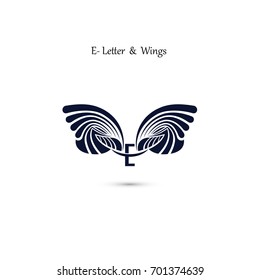 E-letter sign and angel wings.Monogram wing vector logo template.Classic emblem.Elegant dynamic alphabet letters with wings.Creative design element.Flat web design wings icon.Vector illustration.