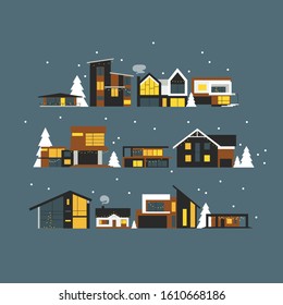 Eleven vector isolated modern eco-friendly country houses in a minimalist style of black, white, brown colors on a dark snowy background with fir trees and garlands at night. The lights are on in the 