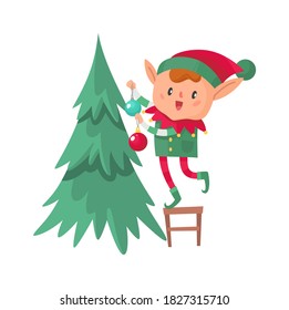 Elf decorates Christmas tree. Santa Claus cute fantasy helper, adorable dwarf on chair with xmas ball and fir-tree for winter holidays, New Year celebration vector cartoon isolated on white character