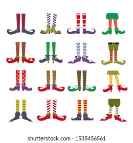 Elf feet flat cartoon colourful vector illustrations. Leprechaun shoes and stripped socks icons set. Christmas dwarf leg in funny boots isolated on white background. Festive christmas gnome bundle