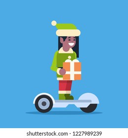 elf girl santa claus helper ride electric scooter merry christmas holiday new year concept flat vector illustration