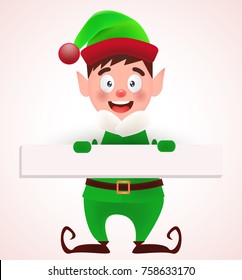 Elf in green costume with empty sign 
