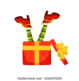 Elf legs in gift box flat vector illustration. Little santa helper opening christmas present isolated on white background. Winter season holiday celebration, xmas tradition design element.