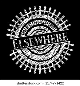 Elsewhere chalkboard emblem on black board