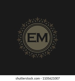 EM initial logo. Luxury ornament crown logo.