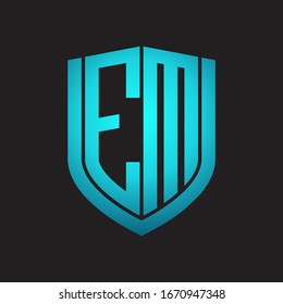 EM Logo monogram with emblem shield design isolated with blue colors on black background