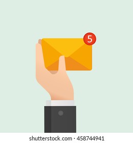 Email concept. Hand holding letter. Mail delivery service.