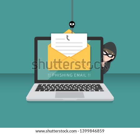 Email data phishing with cyber thief hide behind Laptop computer. Hacking concept. 