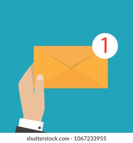 Email and incoming messages concept. Vector illustration. Hand holds envelope.