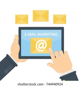 E-mail marketing concept. Hands holding tablet with mailbox.