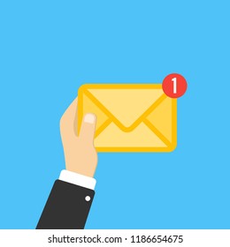 Email message concept. New, incoming message, sms. Hand holding envelope, letter. Delivery of messages, sms. Mail notification sending messages Coming messages