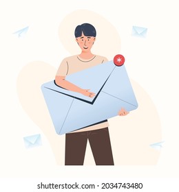 Email message sending and receiving concept man holding big closed envelope