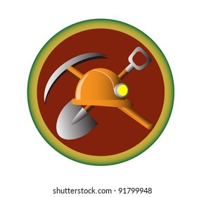 The emble of the miner work, with the shovel, pick and helmet on it.