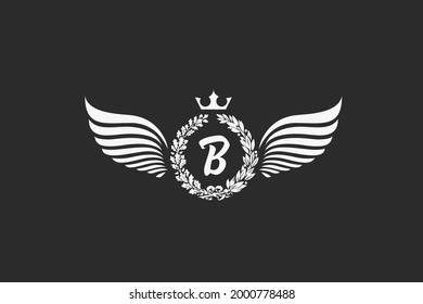 Emblem letter crest heraldic with wings logo