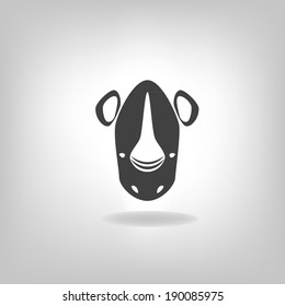 emblem a rhinoceros on a light background