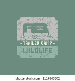 Emblem with rough texture for trailer camp. Graphic design for t-shirt. Color print on green background