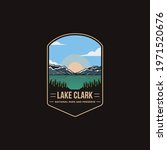 Emblem sticker patch logo illustration of Lake Clark National Park and Preserve on dark background, lake and snow mountain vector badge