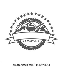 emblem of wild with mountains