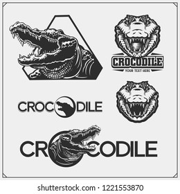 The emblems with crocodile for a sport team. Crocodile labels, badges and design elements.