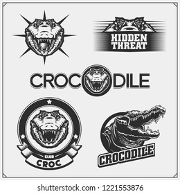 The emblems with crocodile for a sport team. Crocodile labels, badges and design elements.