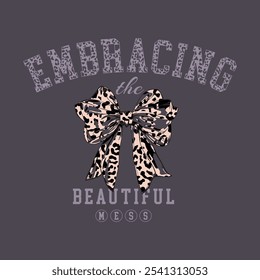 'Embracing the Beautiful Mess,' designed for T-shirt printing. Graphic bow with leopard pattern inside.