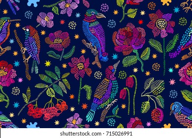 Embroidered carpet inspired by folk art. Seamless vector pattern with birds, rowan and flowers. Vintage motifs. Retro textile design collection. Colorful on dark.