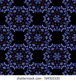 Embroidered colorful seamless pattern. Vector fashion embroidery imitation in blue, violet and black colors for prints or fabric. Stitched ethnic design with flowers, leafs and Mandalas.