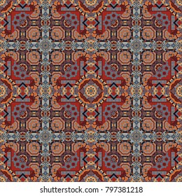 Embroidered colorful seamless pattern. Vector fashion embroidery imitation in gray, red and brown colors for prints or fabric. Stitched ethnic design with flowers, leafs and Mandalas.