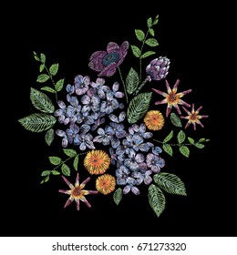Embroidered composition with branch of lilac, flowers and leaves. Satin stitch embroidery floral design on black background. Folk line trendy pattern for clothes, dress, fabric, decor.
