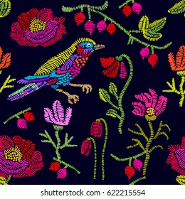 Embroidered flowers and birds. Abstract vector background with colorful poppies and tulips. Retro textile collection.