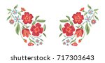 Embroidered flowers on a white background. Vector floral print.