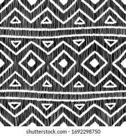 Embroidered geometric pattern. Black patches on a white background. Handmade ornament. Embroidery, fancywork, sewing, hobby. Vector illustration.