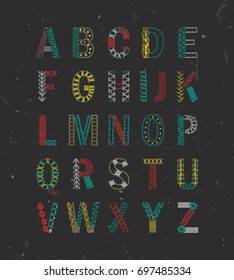 Embroidered hand drawn alphabet. Letters colorful crocheted, knitted with different stiches. Amazing modern beautiful textured font. Black grunge background. Capital letters. Fashion script.