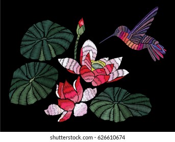 Embroidered hummingbird and lily flowers. Lotus and bird on a black background for embroidery, patches and stickers. Vector Illustration.