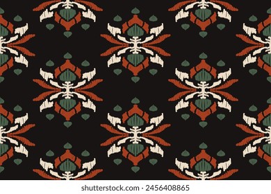 Embroidered Ikat flower pattern on a black background. Traditional ethnic ikat, Aztec abstract vector pattern, seamless pattern in tribal, folk embroidery and Mexican style.