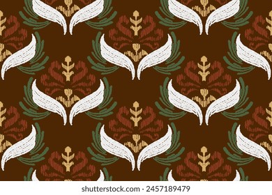 Embroidered Ikat flower pattern on a brown background. Traditional ethnic ikat, Aztec abstract vector pattern, seamless pattern in tribal, folk embroidery and Mexican style.