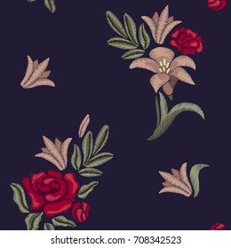 Embroidered lilies and roses. Seamless pattern. Vector floral print.