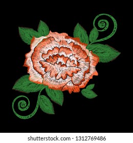 Embroidered rose on a black background. Russian and Asian motifs. Clothing, style, fashion.