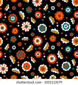 Embroidered seamless floral pattern. Handmade. Colorful embroidery. Cute simple print for textiles. Red, blue, orange and white plants on a black background. Vector illustration.