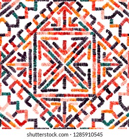 Embroidered seamless geometric pattern. Ornament for the carpet. Ethnic and tribal motifs. Colorful print of handmade. Vector illustration.