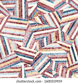 Embroidered seamless geometric pattern. Ornament for the carpet. Ethnic and tribal motifs. Vintage grunge texture. Colorful print of handmade. Wallpaper patchwork. Vector illustration.