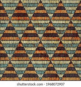 Embroidered seamless geometric pattern. Ornament for the carpet. Ethnic and tribal motifs. Colorful print of handmade. Vector illustration.
