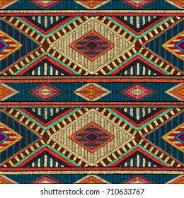 Embroidered seamless geometric pattern. Ornament for the carpet. Ethnic and tribal motifs. Colorful print of handmade. Vector illustration.