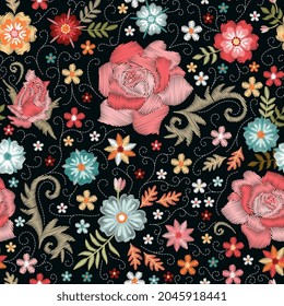 Embroidered seamless pattern with beautiful flowers. Decorative embroidery.